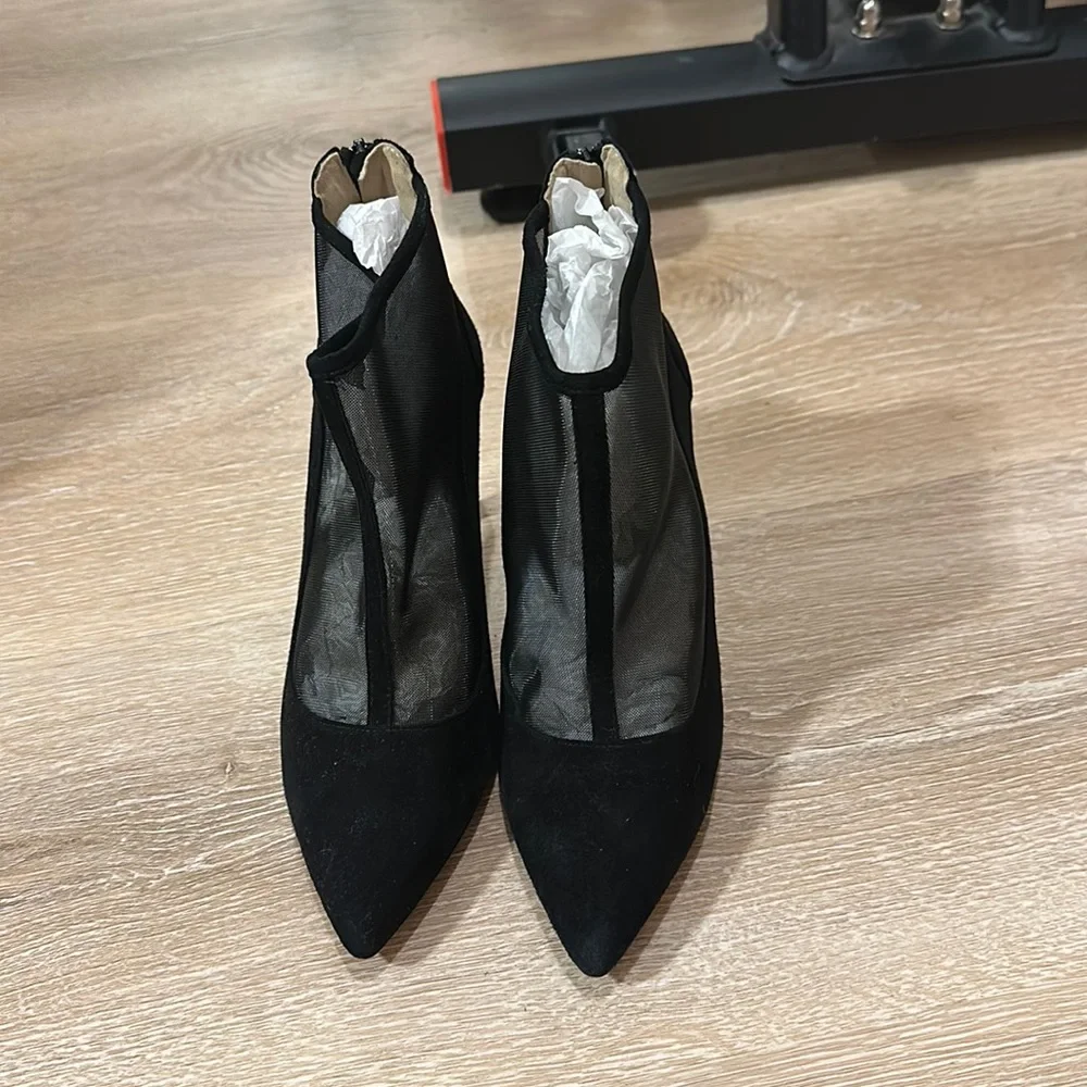 High heeled stiletto leather and mesh cutout ankle booties
